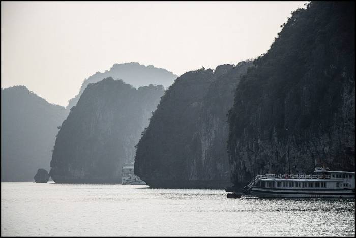 sailing among the limestone rocks Hạ Long Bay