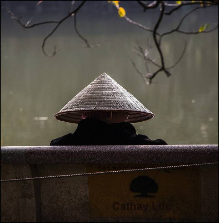 ubiquitous palm leaf conical hats Hanoi