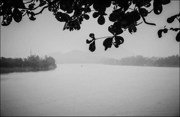 Perfume River - in autumn orchard flowers fall into the water and give the river a flowery aroma Perfume River - in autumn orchard flowers fall into the water and give the river a flowery aroma