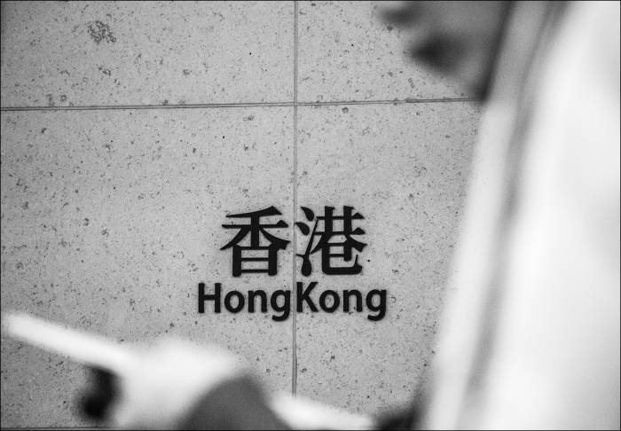 reading at Hong Kong station reading at Hong Kong station