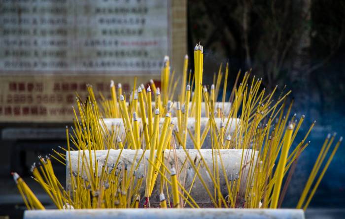 huge incense sticks burning at the Po Lin Monastery huge incense sticks burning at the Po Lin Monastery