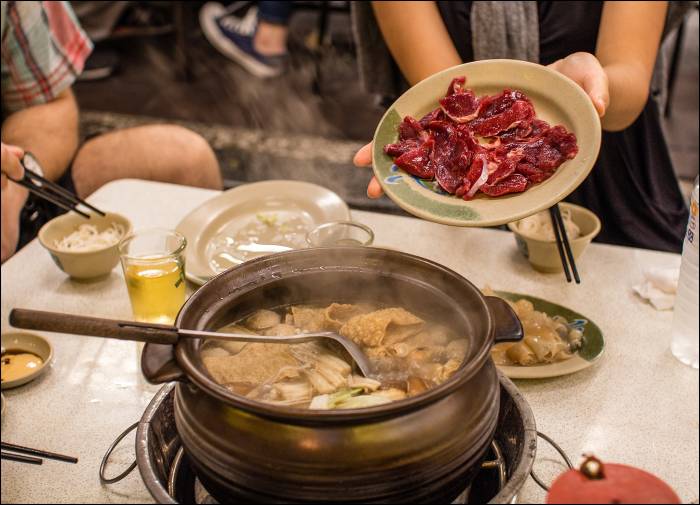 adding some meat to the broth adding some meat to the broth